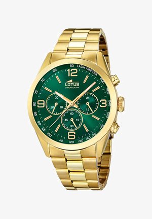 Montre chronographe en acier inoxydable doré avec un cadran vert, de grands chiffres arabes, trois sous-cadrans et des marquages tachymétriques.