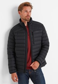 Black puffer jacket with horizontal stitching, high collar, and zippered pockets. Worn over a maroon shirt, paired with blue jeans.