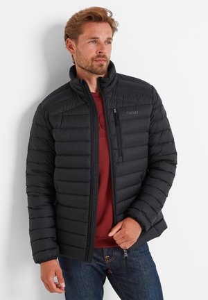 Black puffer jacket with horizontal stitching, high collar, and zippered pockets. Worn over a maroon shirt, paired with blue jeans.
