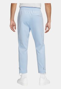 Nike Sportswear Tygbyxor - light blue