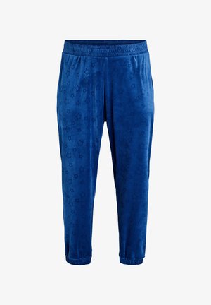 Blue velour joggers with an elastic waistband, featuring embossed star patterns. Cuffs at the ankle for a tapered fit. Soft texture.