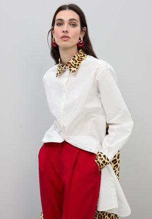 Blusa - leopard
