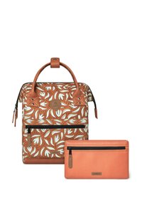 Brown and cream floral print backpack with a structured design and leather accents, accompanied by a textured orange zippered pouch.