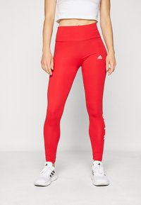 adidas Sportswear Leggingek - better scarlet