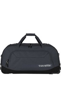 Bolso de lona oscuro con un acabado texturizado, detalles en negro, compartimentos con cremallera y asas dobles para llevar. Presenta la marca "travelite".