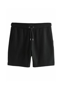Shorts de bain noirs avec texture cannelée verticale, taille élastique, cordon de serrage et poches latérales. Coupe standard et longueur au-dessus du genou.