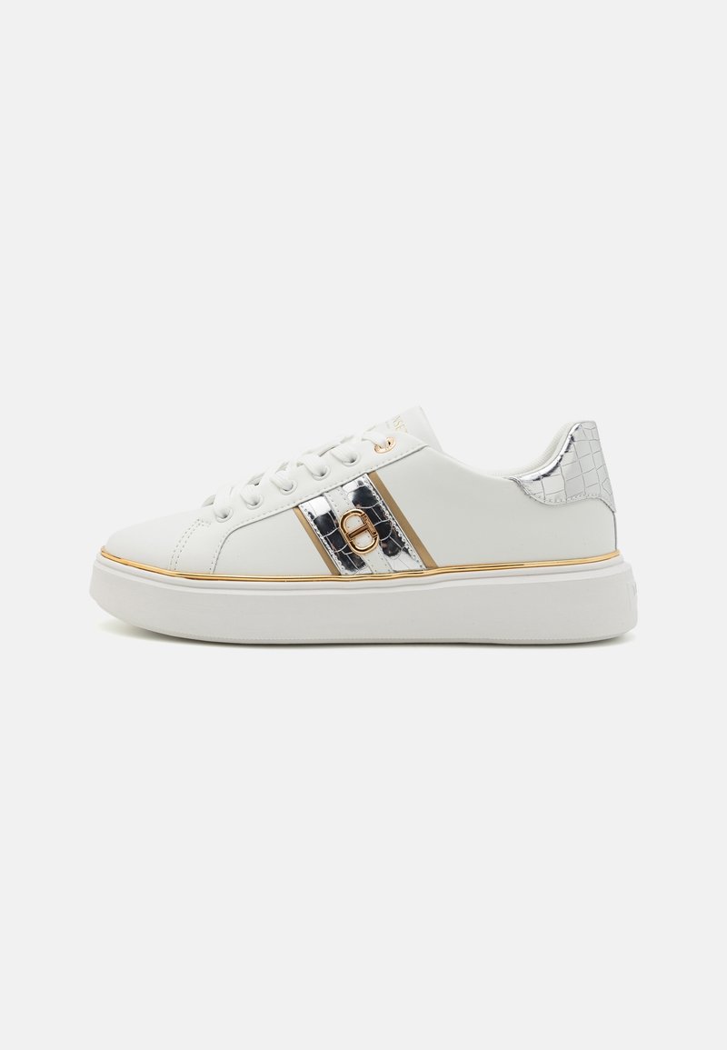 White sneaker with a glossy metallic accent, featuring a crocodile texture stripe and gold-tone hardware, thick white sole, and lace-up front.