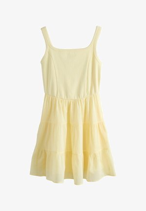Sleeveless light yellow sundress with square neckline, fitted ribbed bodice, and gathered tiered skirt falling above the knee.