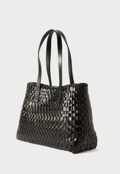 Black woven tote bag with smooth leather straps, features a structured shape, textured surface, and open top design for easy access.