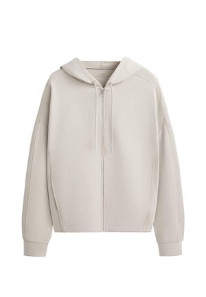 Sweat à capuche gris clair avec fermeture éclair, doté d'une capuche, de manches longues, de poignets côtelés et de poches latérales. Tissu doux avec une texture lisse. Design simple.