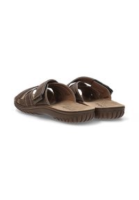 Sandali in pelle marrone con design aperto, cinturini in Velcro, suole testurizzate e plantari imbottiti per comfort e facilità d'uso.