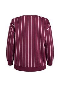 Burgundski pulover s belimi navpičnimi črtami, okroglo izrezan, z dolgimi rokavi in elastičnimi manšeti ter spodnjim robom. Mehka tkanina.