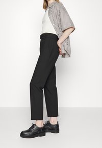 HUGO Tygbyxor - black