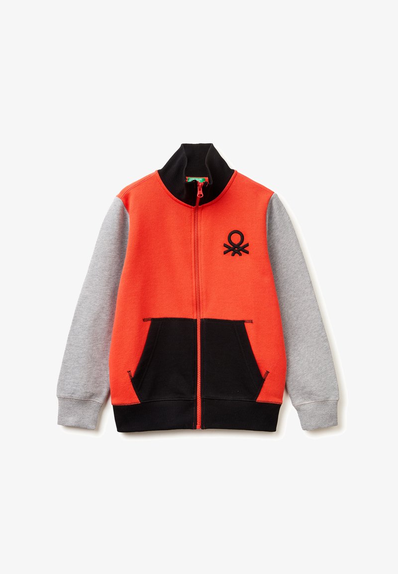 Child’s zip-up jacket with orange body, gray sleeves, black collar, black front pockets, and a small black logo on the chest.