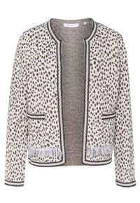 Neulejakku, jossa on eläinkuosilla kuvioitu beige ja ruskea kangas. Sisältää musta-valkoisen reunuksen, kaksi etutaskua ja harsotuksen helmassa.