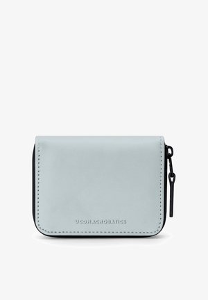 Compact light blue zip-around wallet with black zipper pull and UCON ACROBATICS logo embossed on front center.