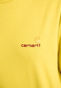Carhartt WIP AMERICAN SCRIPT - Basic T-shirt - golden olive