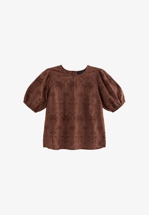 Bruine blouse met korte mouwen, opgeblazen mouwen en subtiele bloemrijke ajourborduursels over de hele stof.