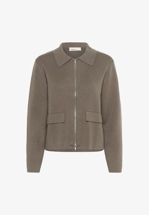 Pruun kudumiga jakk krae, esit zipper ja kaks taskut vööl. Tekstuuriga kangas ja soonikkäised detailid.