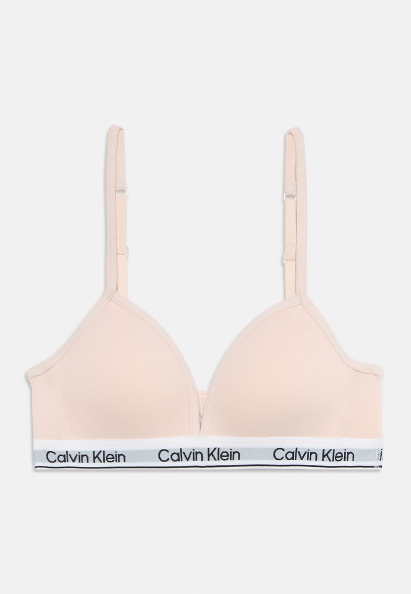 Ανοιχτό μπεζ bralette με ρυθμιζόμενους λεπτούς ιμάντες και λευκή ελαστική ταινία με επαναλαμβανόμενα μαύρα λογότυπα "Calvin Klein".