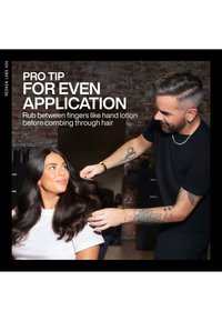 Hairstylist combing a woman’s long dark hair in a salon with a brick wall background and hair care tip text on the left.