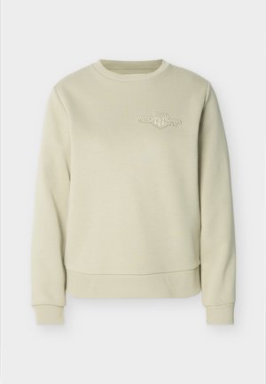 Sweat-shirt beige à col rond avec poignets et ourlet côtelés, arborant un petit logo blanc brodé sur la partie supérieure gauche de la poitrine.