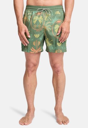 Zielone spodenki kąpielowe z elastycznym paskiem, sznurkiem do regulacji i tropikalnym wzorem z palmami oraz kwiatami w odcieniach pomarańczu i żółci.