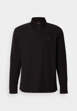 Czarna, długosleeve koszulka polo wykonana z bawełny, z kołnierzykiem, zapięciem na guziki oraz małą naszywką z logo na lewej piersi.