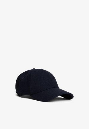 Casquette de baseball bleu marine foncé avec une visière incurvée, présentant une texture subtile en chevrons, sur fond blanc.
