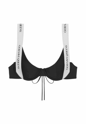Black bra with underwire, featuring wide white straps marked "GOD SAVE QUEENS." Textured fabric and decorative tie detail at the center front.