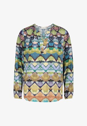 Langærmet bluse med et farverigt geometrisk mønster i nuancer af grøn, blå, lilla og brun; V-udskæring, afslappet pasform, letvægtsstof.
