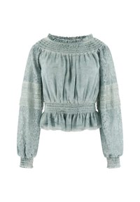 Light blue blouse with smocked neckline and waist, featuring lace long sleeves and a ruffled hem. Textured fabric with floral lace patterns.