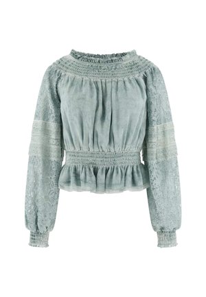 Light blue blouse with smocked neckline and waist, featuring lace long sleeves and a ruffled hem. Textured fabric with floral lace patterns.