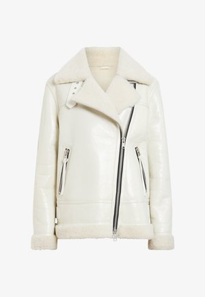Jachetă din piele crem cu guler din blană de oaie, fermoar frontal și două buzunare laterale. Prezintă o textură moale și un finisaj lucios neted.