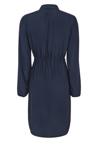Robe bleu foncé à manches longues, longueur genou, avec taille froncée, poignets élastiques et petit col, vue de dos.