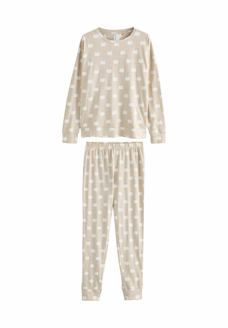 Beige pyjamaset med långärmad topp och byxor. Tyget har ett upprepat mönster av vita pumpor. Elastisk midja på byxorna.