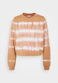 Oříznutá mikina s dlouhým rukávem v béžovém a růžovém batikovaném vzoru, s kulatým výstřihem a žebrovanými manžetami. Jemná struktura látky.