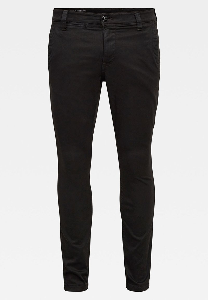 Pantalon slim noir pour homme avec fermeture par bouton et fermeture éclair, poches avant et arrière, présenté sur un fond uni.