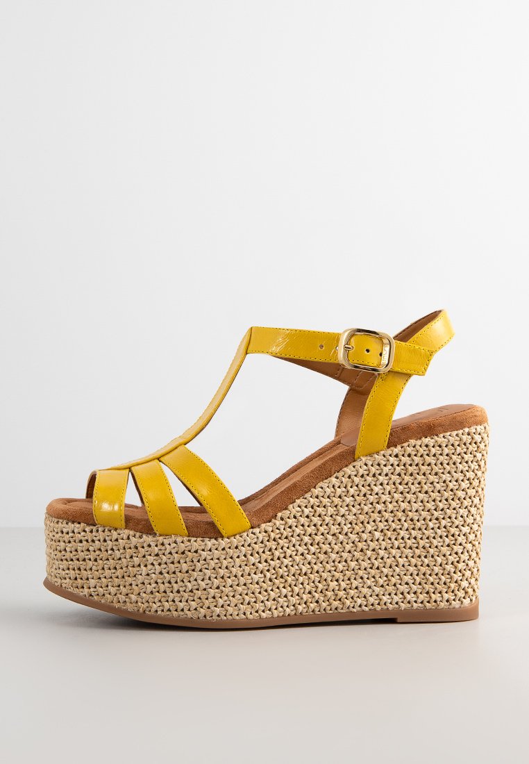Unisa Sandalen met sleehak geel