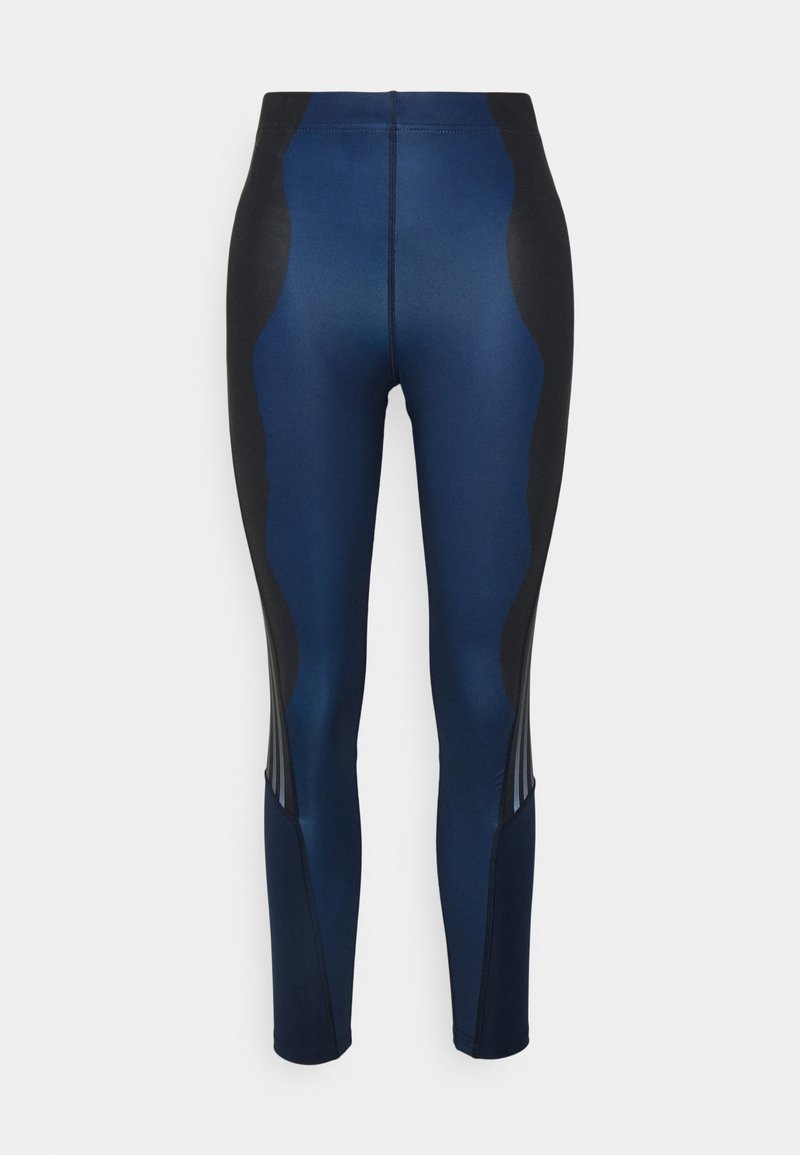 Leggings blu navy con pannelli laterali neri, caratterizzati da una texture liscia e dettagli di cucitura a contrasto, progettati per l'attività fisica.