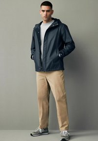 Next RUBBERISED HOODED-REGULAR FIT - Jachetă impermeabilă - navy blue