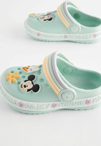 Next MINNIE MOUSE CHARACTER  - Puukengät - green