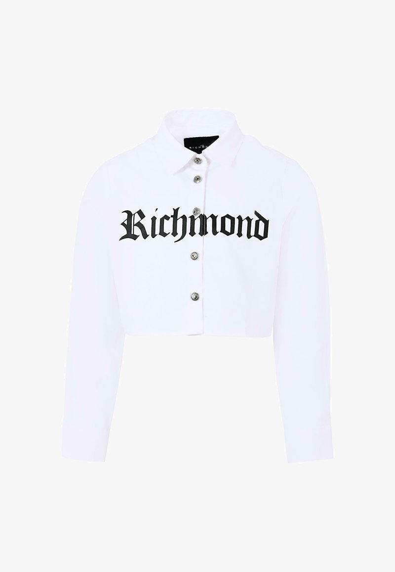 Camicetta bianca a maniche lunghe, con stampa nera "Richmond" e chiusura con bottoni argentati sul davanti. Tessuto morbido.