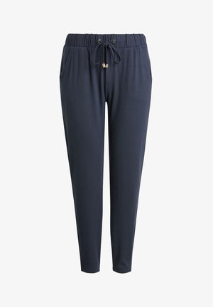 Navy blauwe joggers gemaakt van zachte stof, met een elastische tailleband met een trekkoord en zijzakken voor praktisch gebruik.