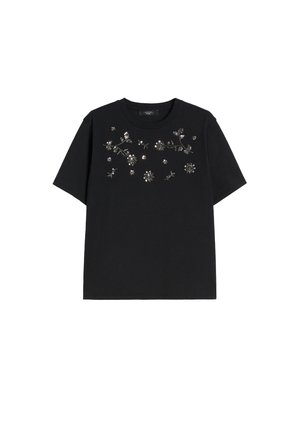 T-shirt nera a maniche corte con decorazioni floreali argentate sulla parte superiore del petto e scollo rotondo.