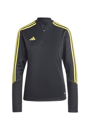 Czarny sportowy top z długim rękawem, żółtymi paskami na rękawach, krótkim zamkiem z przodu i żółtym logo na lewej piersi.