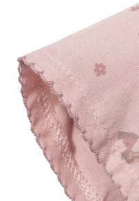 Pink cotton fabric with a subtle floral pattern, featuring a scalloped edge and textured surface. Soft and lightweight material.