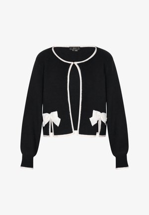 Schwarze Strickjacke mit weißen Akzenten und Schleifchen am Saum. Verfügt über einen runden Ausschnitt und lange Ärmel mit gerippten Bündchen.