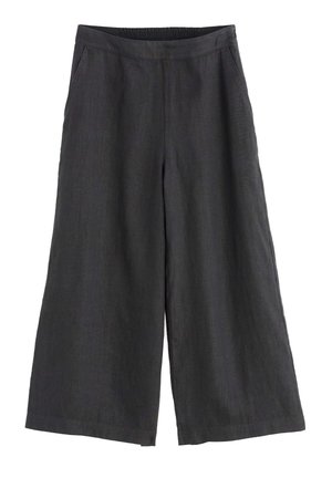 Plati kojinės tamsiai pilko lininio audinio su elastinga juosta ir šoninėmis kišenėmis. Audinys turi tekstūruotą paviršių ir lengvą dizainą.