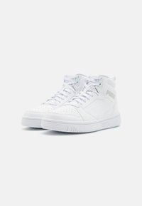 High-top white sneakers with a smooth leather texture, perforated detailing, and a prominent side logo. Features laces and a rubber sole.